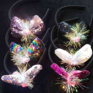 cod.amsa 1197vinchas con lentejuelas moños x 12